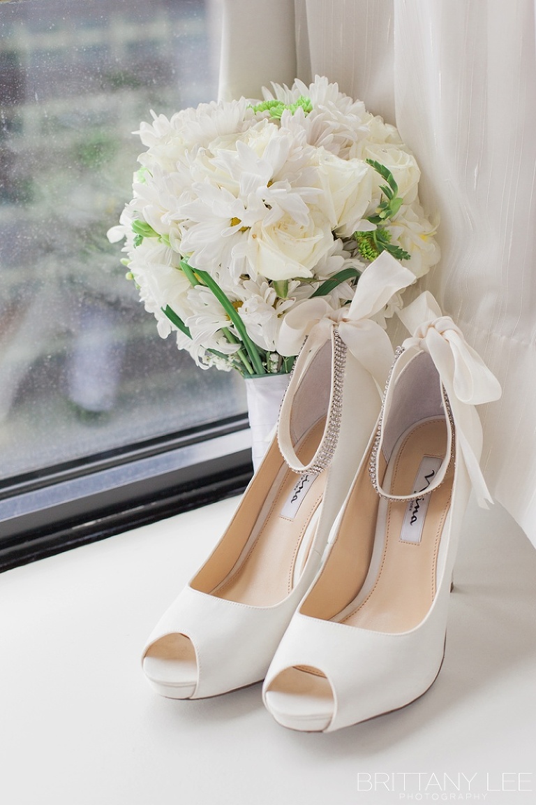 Brides shoes and bouquet 