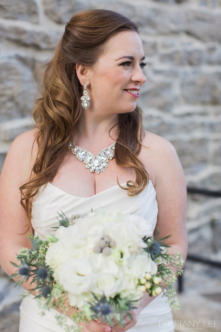 Bride in white dress and groom in Scottish kilt