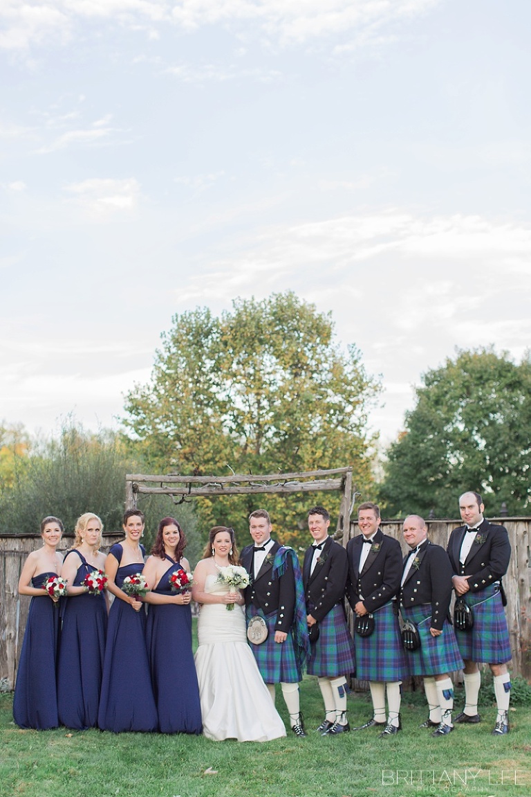 Wedding party portraits - bridesmaids in purple and groomsmen in Scottish kilts