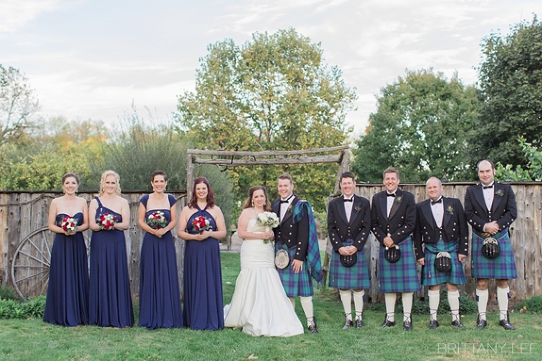 Wedding party portraits - bridesmaids in purple and groomsmen in Scottish kilts