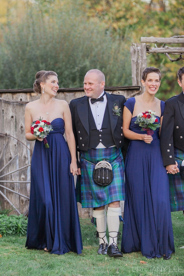 Wedding party portraits - bridesmaids in purple and groomsmen in Scottish kilts