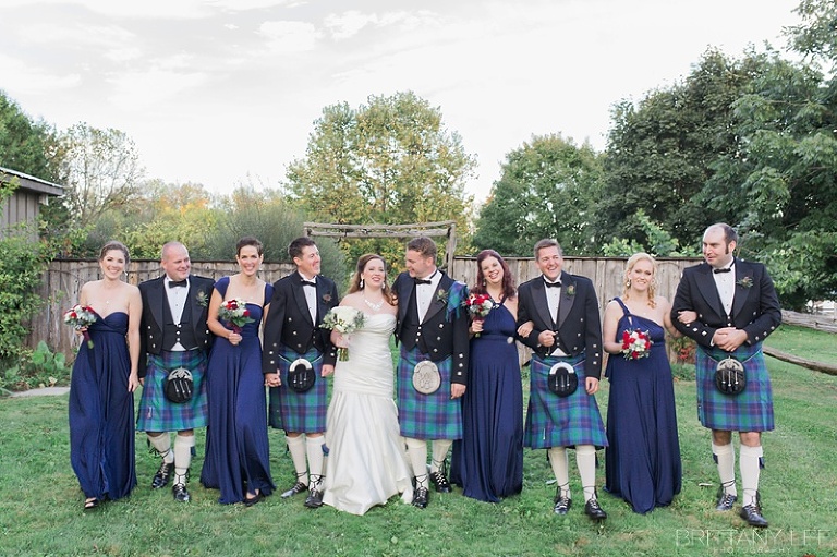 Wedding party portraits - bridesmaids in purple and groomsmen in Scottish kilts