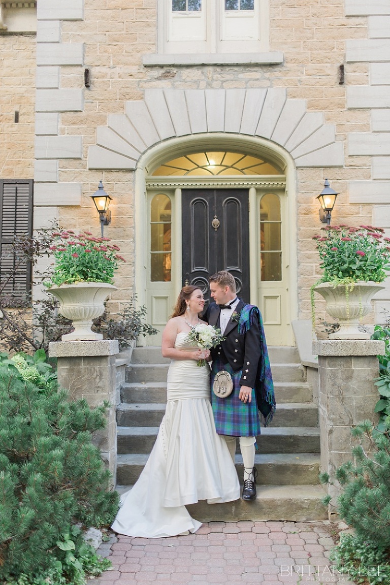 Bride in white dress and groom in Scottish kilt