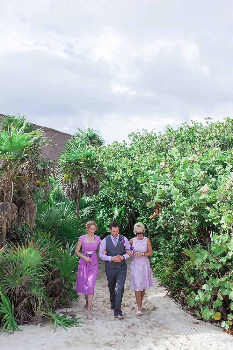 groom and Mothers walking down aisle at Mexico destination wedding