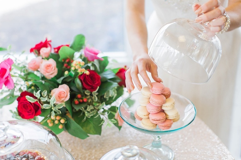 Bride with Wedding Sweets Table