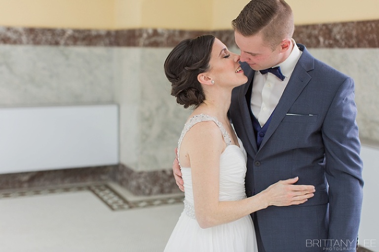 Bride and groom kissing at first look - Ottawa wedding photos