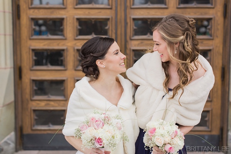 Bride and Bridesmaid in Ottawa Winter wedding at the Lord Elgin Hotel
