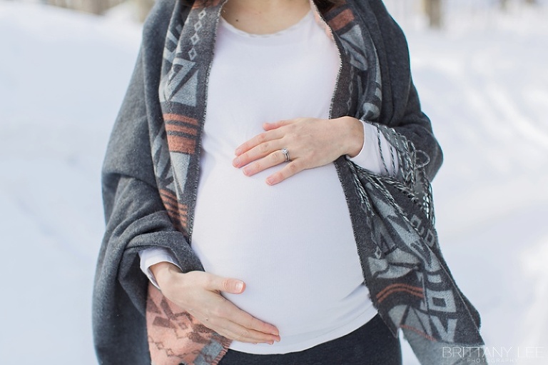 Mont Tremblant Winter Maternity Photos - baby belly with wedding rings
