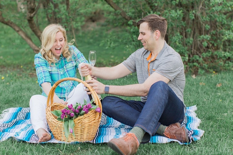 Strathconca Park Engagement Photos - Ottawa Bride and Groom having champagne picnic