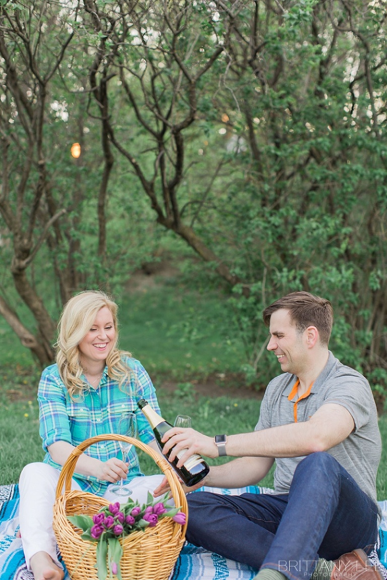 Strathconca Park Engagement Photos - Ottawa Bride and Groom having champagne picnic