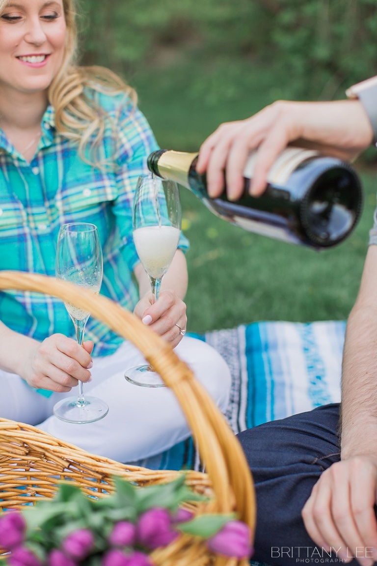 Strathconca Park Engagement Photos - Ottawa Bride and Groom having champagne picnic