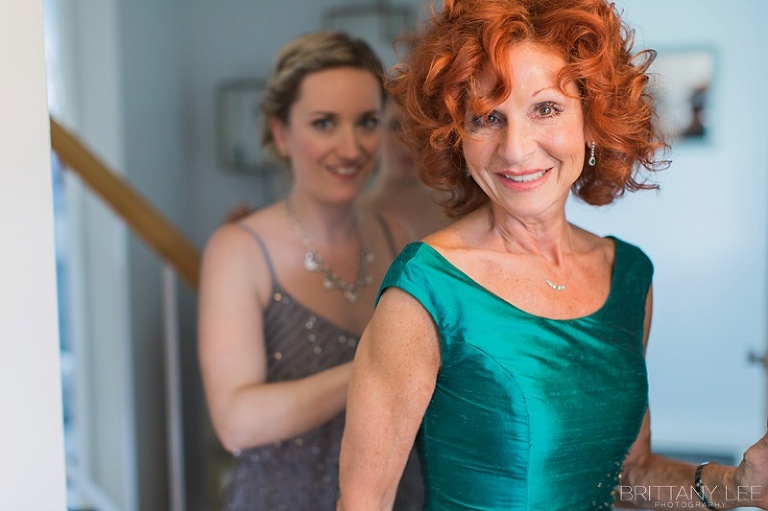 Bride's mom getting ready on wedding day