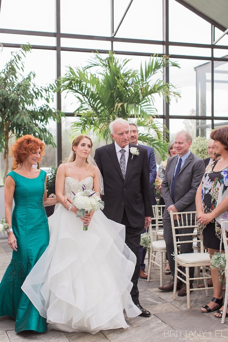White and floral ceremony at Aquatopia - Ottawa wedding photos