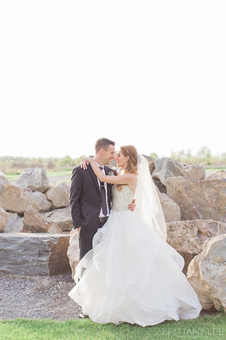 Bride and Groom Wedding photos outside Aquatopia Conservatory Carp Ontario