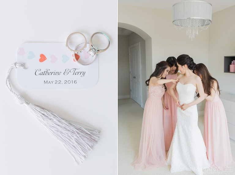 Bridesmaids helping bride into dress