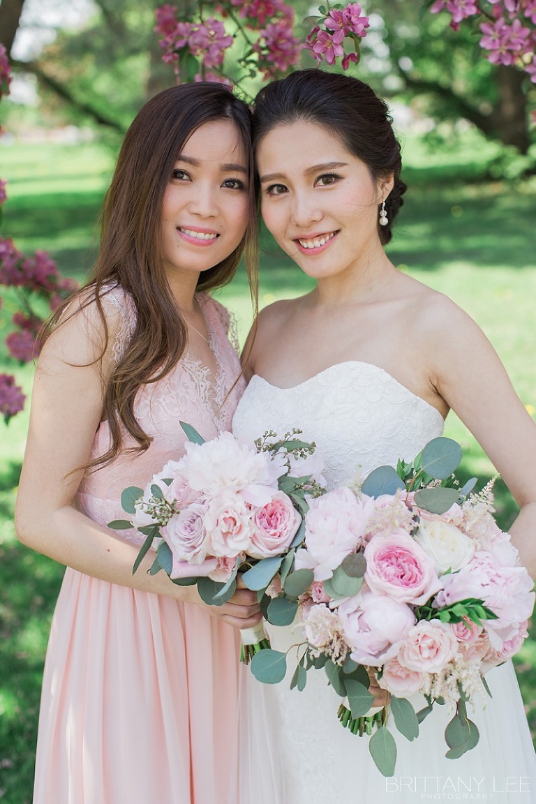 Ottawa wedding party under apple blossom trees