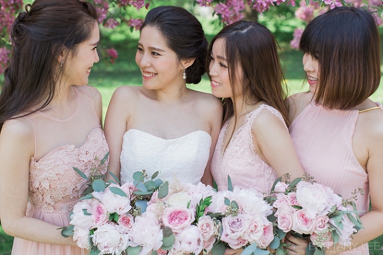 Ottawa wedding party under apple blossom trees