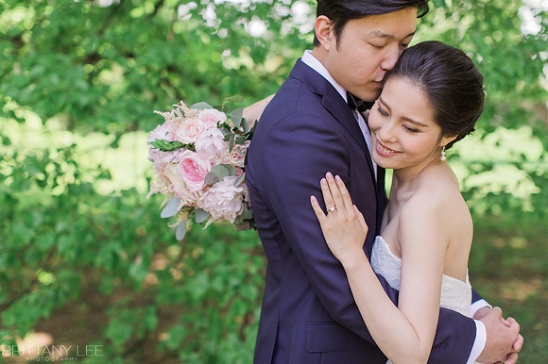 Ottawa wedding party under apple blossom trees