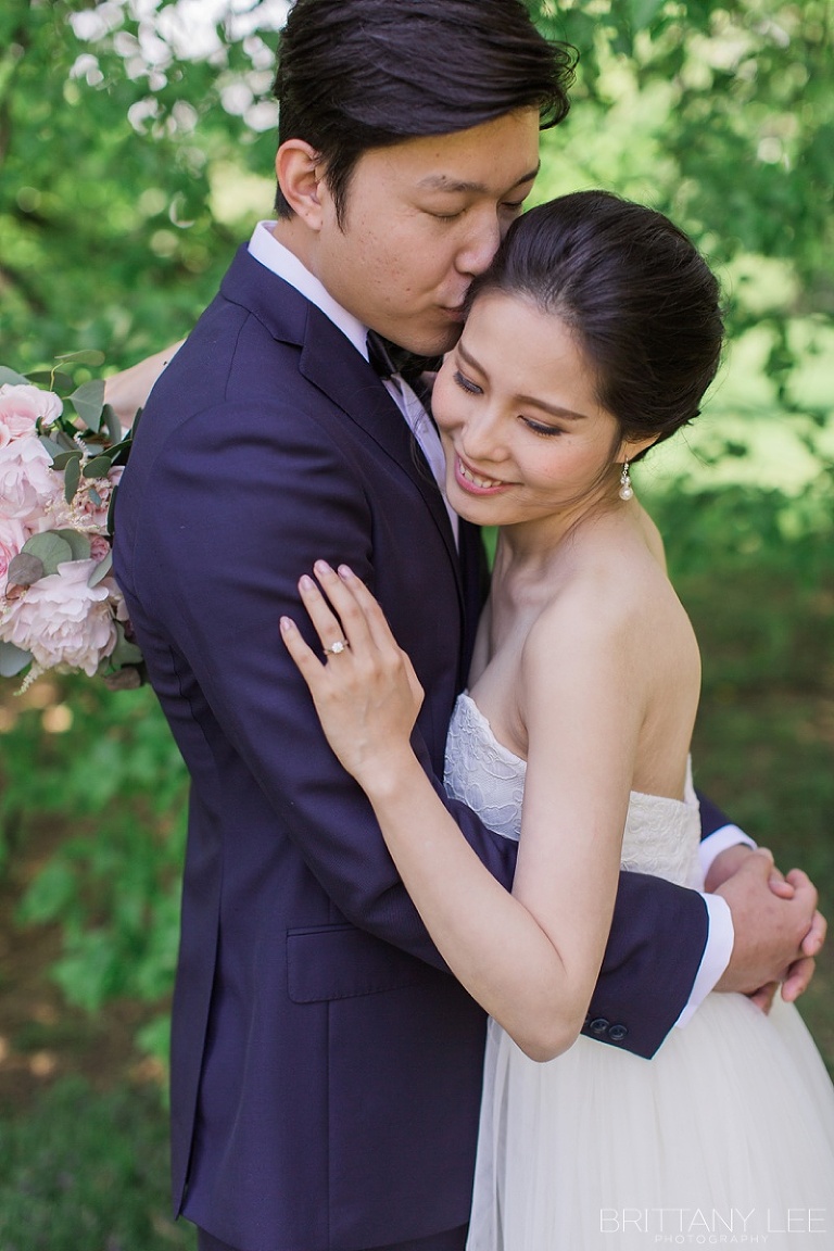 Ottawa wedding party under apple blossom trees