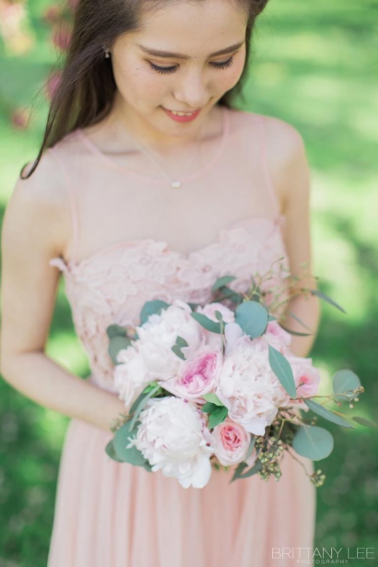 Ottawa wedding party under apple blossom trees