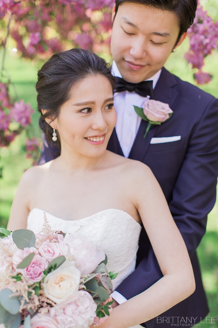 Ottawa wedding party under apple blossom trees