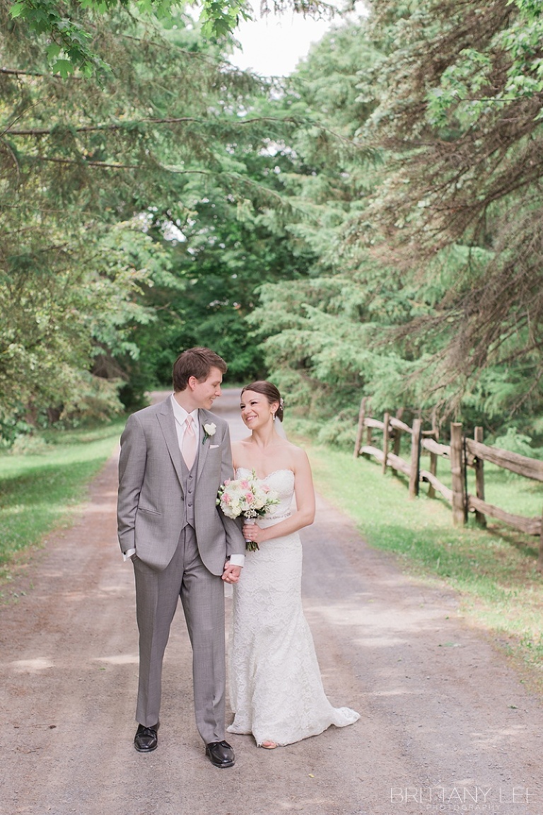Bride and Groom doing First Look photos before their wedding ceremony at Strathmere Garden house