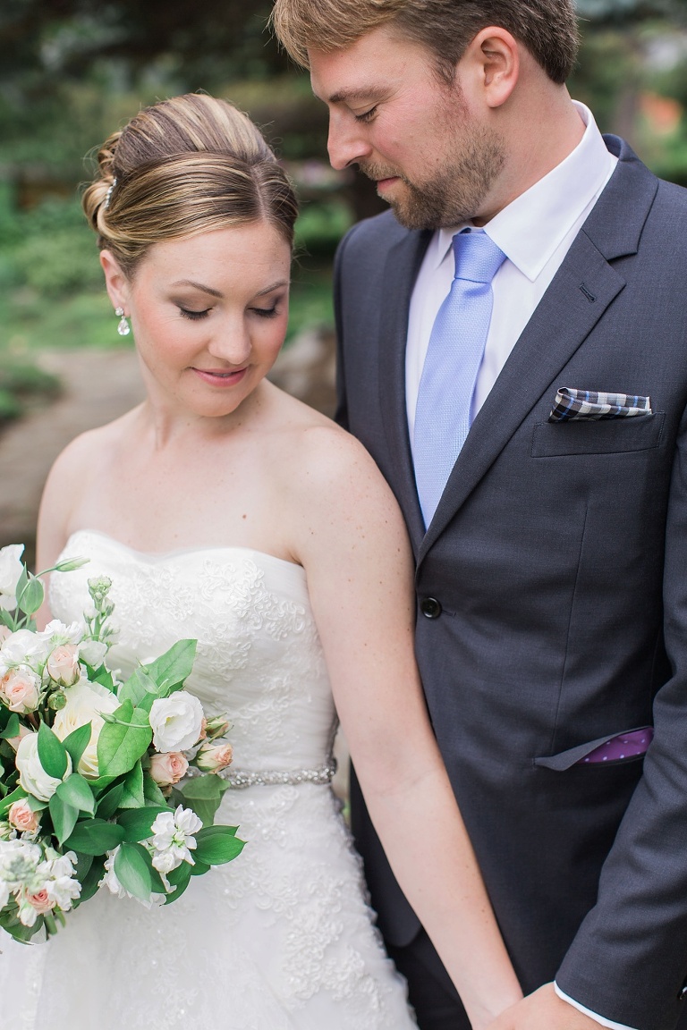 Mill Street Brew Pub Ottawa Wedding - Bride and Groom First Look photos at Ornamental Gardens in Ottawa