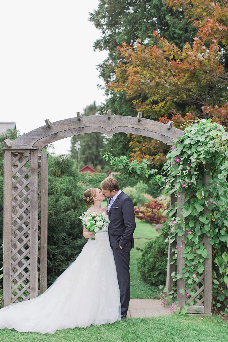 Mill Street Brew Pub Ottawa Wedding - Bride and Groom First Look photos at Ornamental Gardens in Ottawa