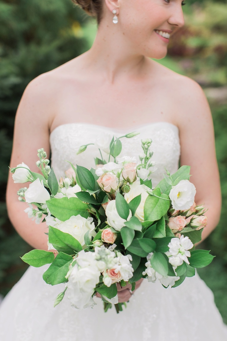 Mill Street Brew Pub Ottawa Wedding - Bride and Groom First Look photos at Ornamental Gardens in Ottawa
