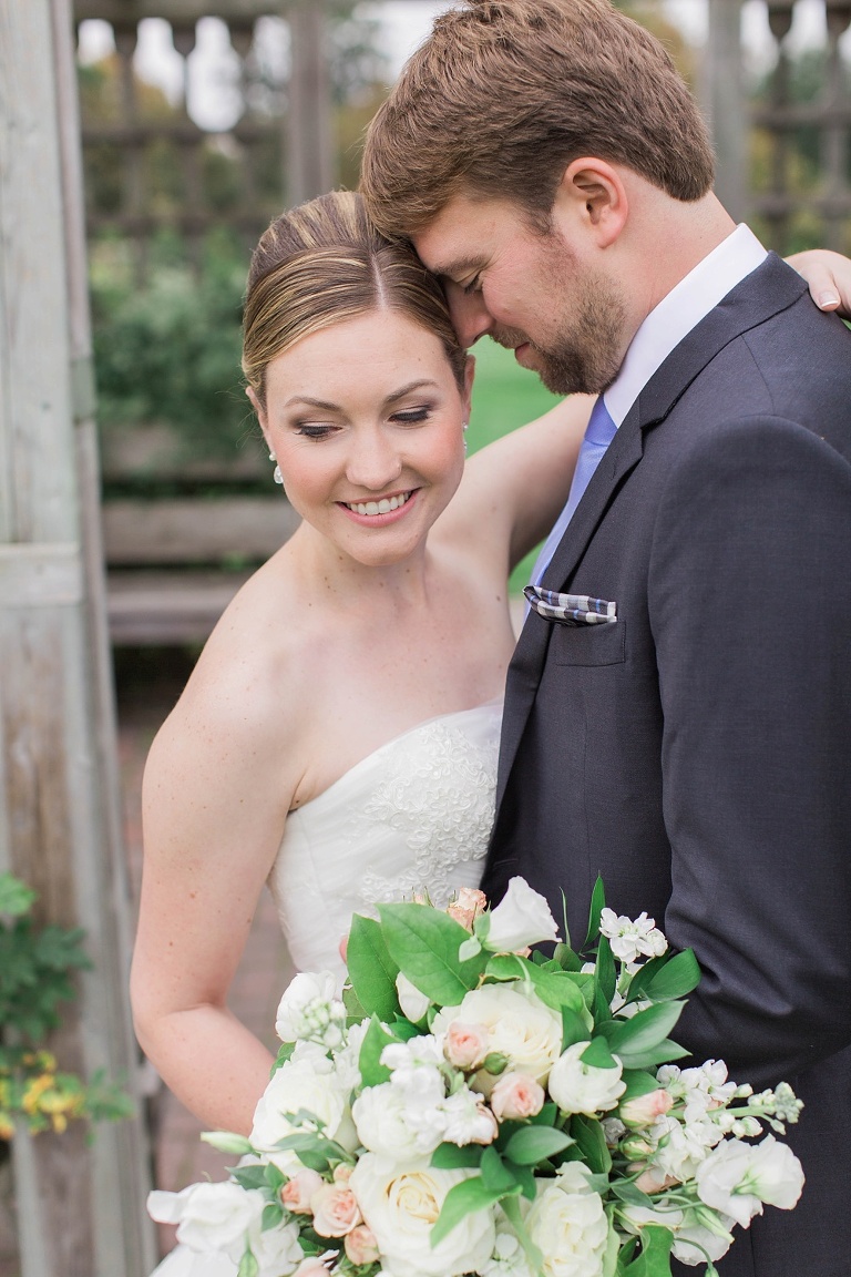 Mill Street Brew Pub Ottawa Wedding - Bride and Groom First Look photos at Ornamental Gardens in Ottawa