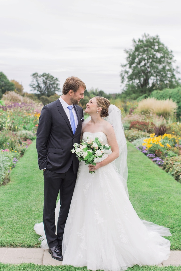 Mill Street Brew Pub Ottawa Wedding - Bride and Groom First Look photos at Ornamental Gardens in Ottawa
