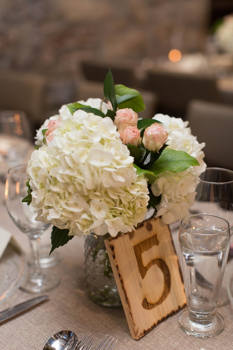 Mill Street Brew Pub Ottawa Wedding - Reception decor with white draping and floral arrangements