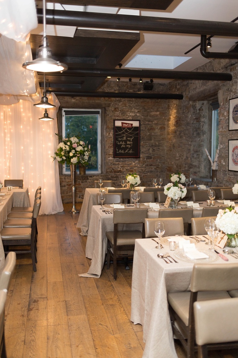 Mill Street Brew Pub Ottawa Wedding - Reception decor with white draping and floral arrangements