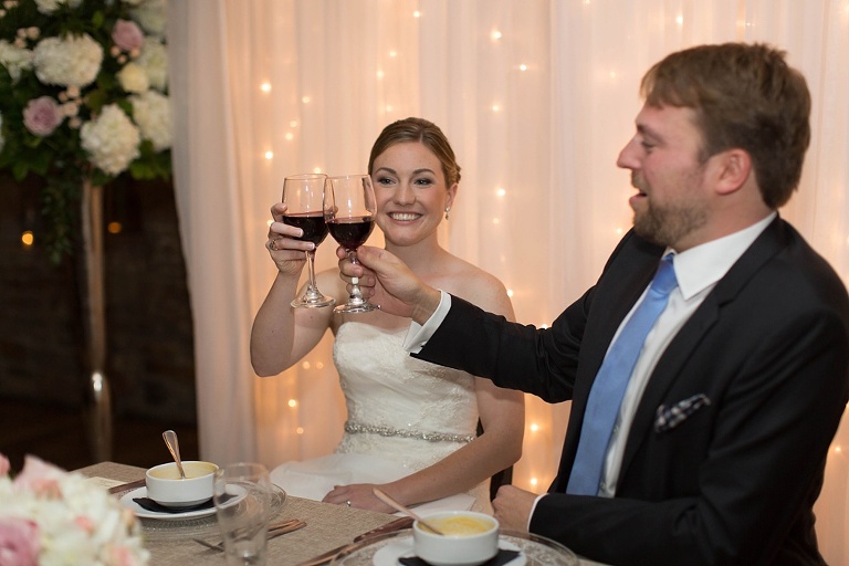 Mill Street Brew Pub Ottawa Wedding - Reception decor with white draping and floral arrangements