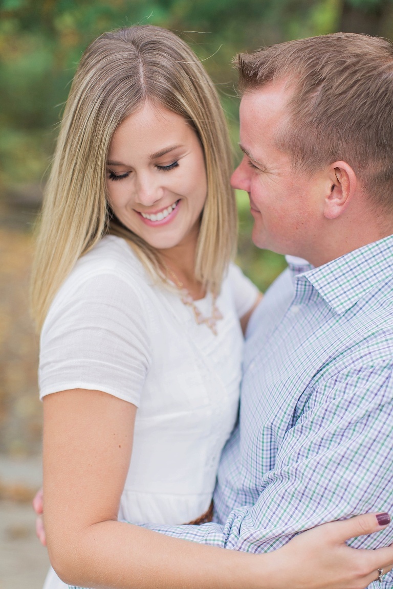 Wakefield fall engagement photos  - couple standing on little wooden bridge
