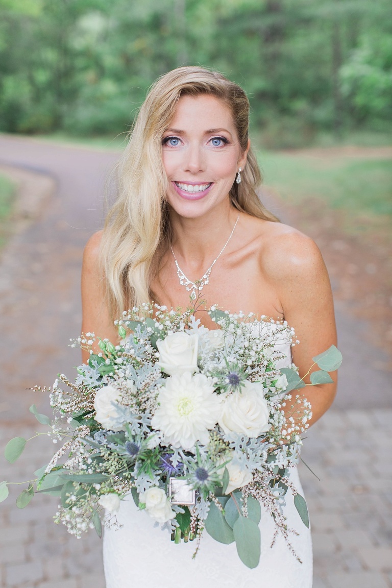 Favourite Wedding Photos from 2016 - Bride carrying big white and greenery bouquet