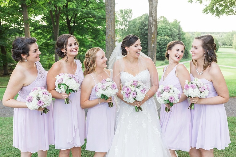 Favourite Wedding Photos from 2016 - Bride and Bridesmaids laughing together at golf course wedding