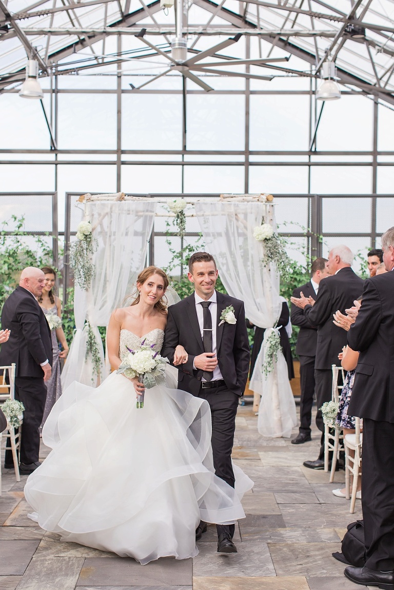 Favourite Wedding Photos from 2016 - Bride and Groom walking down aisle and smiling