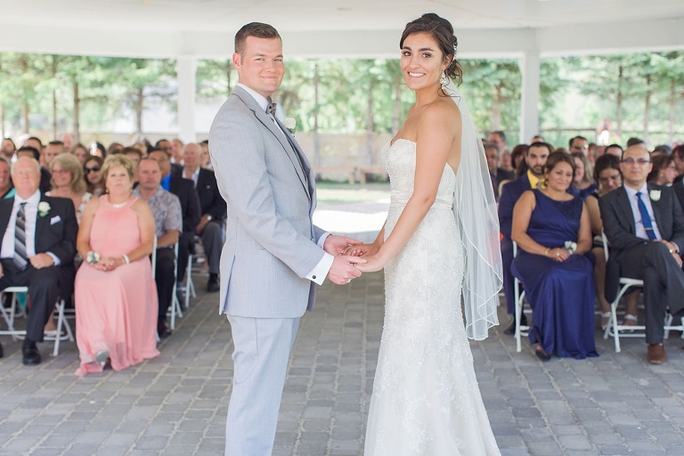 Favourite Wedding Photos from 2016 - Bride and Groom holding gads during the ceremony
