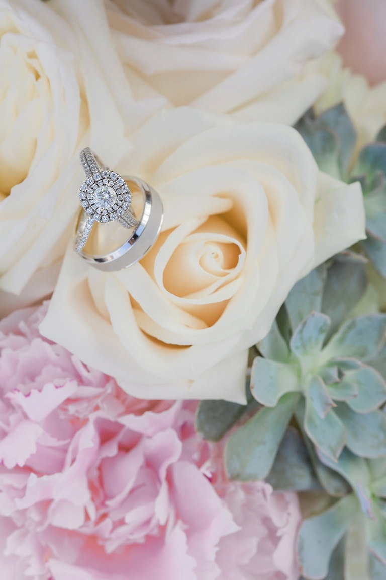 Favourite Wedding Photos from 2016 - Bride's diamond halo ring sitting in her bridal bouquet