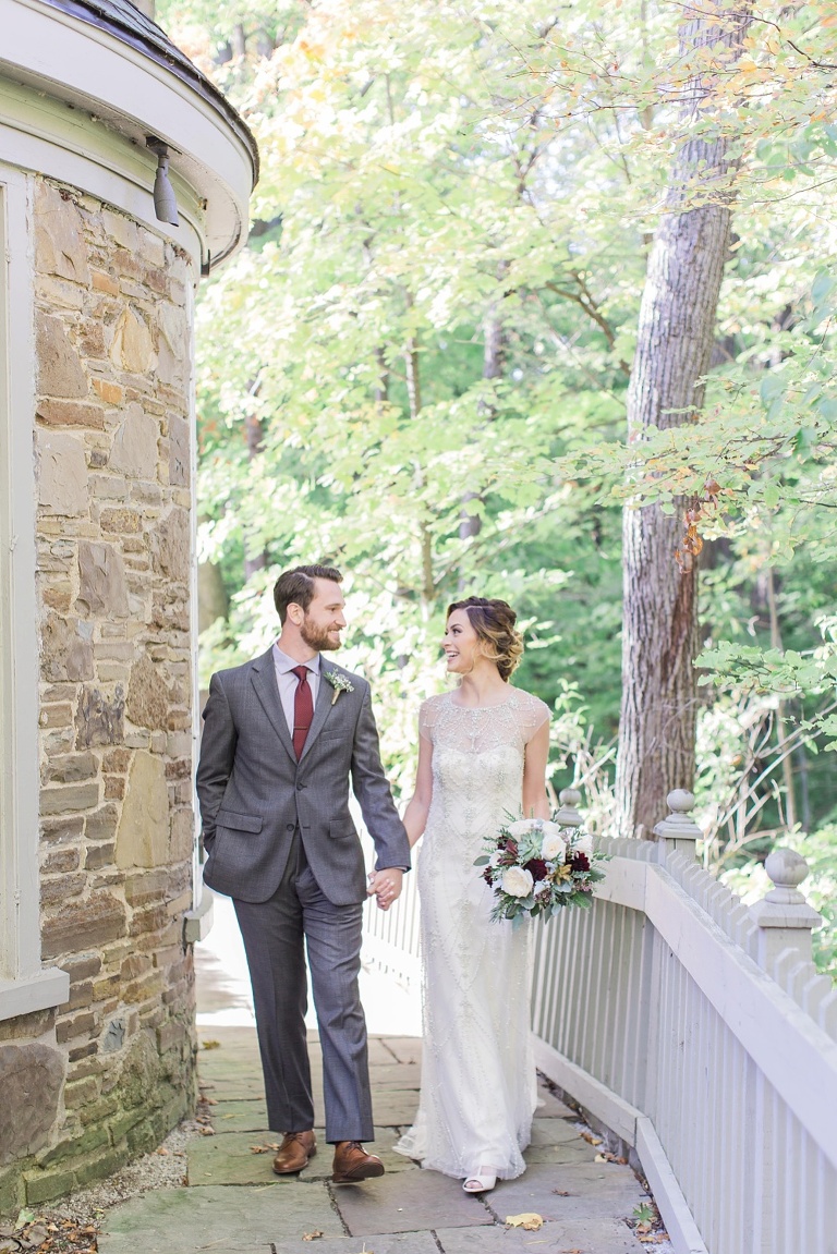 Favourite Wedding Photos from 2016 - Bride and Groom holding hands and walking along heritage Inn in Mississauga, Ontario