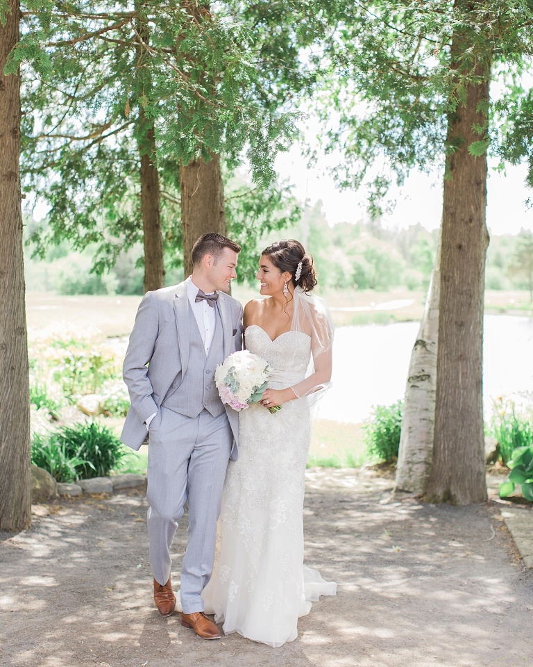 Favourite Wedding Photos from 2016 - Bride and Groom smiling at each other and walking at Orchardview, Ottawa