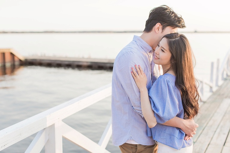 Favourite Engagement Photos from 2016 - couple hugging on a white bridge by the Ottawa river