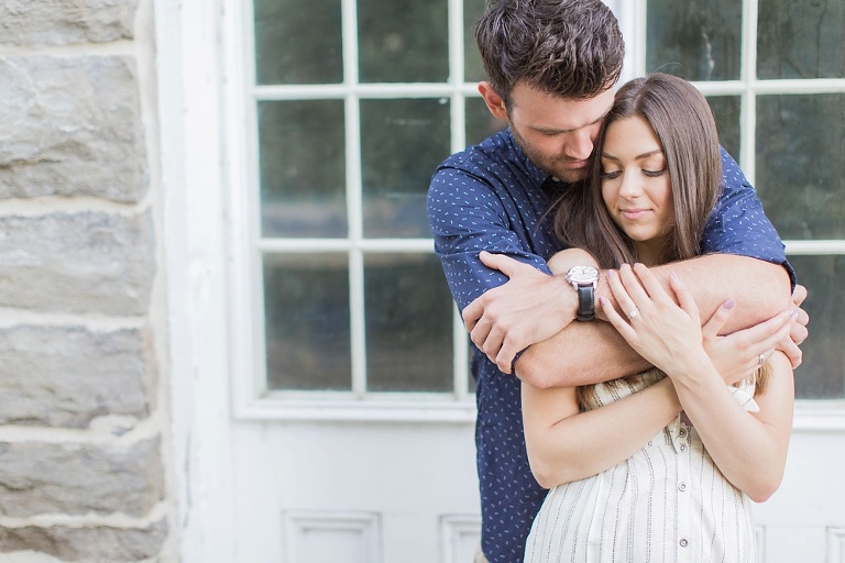 Favourite Engagement Photos from 2016 - Groom wrapping his arms around the bride and hugging her close