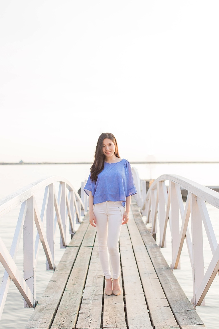 Favourite Engagement Photos from 2016 - woman stating on white bridge at the Ottawa River engagement photos