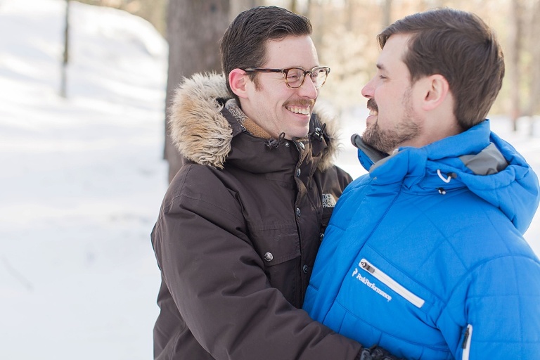 Gatineau Park winter engagement session with a same sex couple
