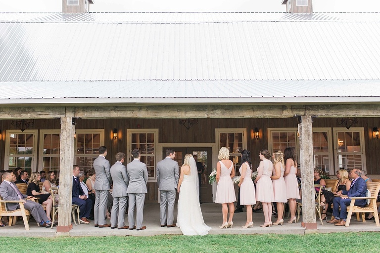 Stonefields Heritage Farm Wedding - ceremony photo on covered barn terrace