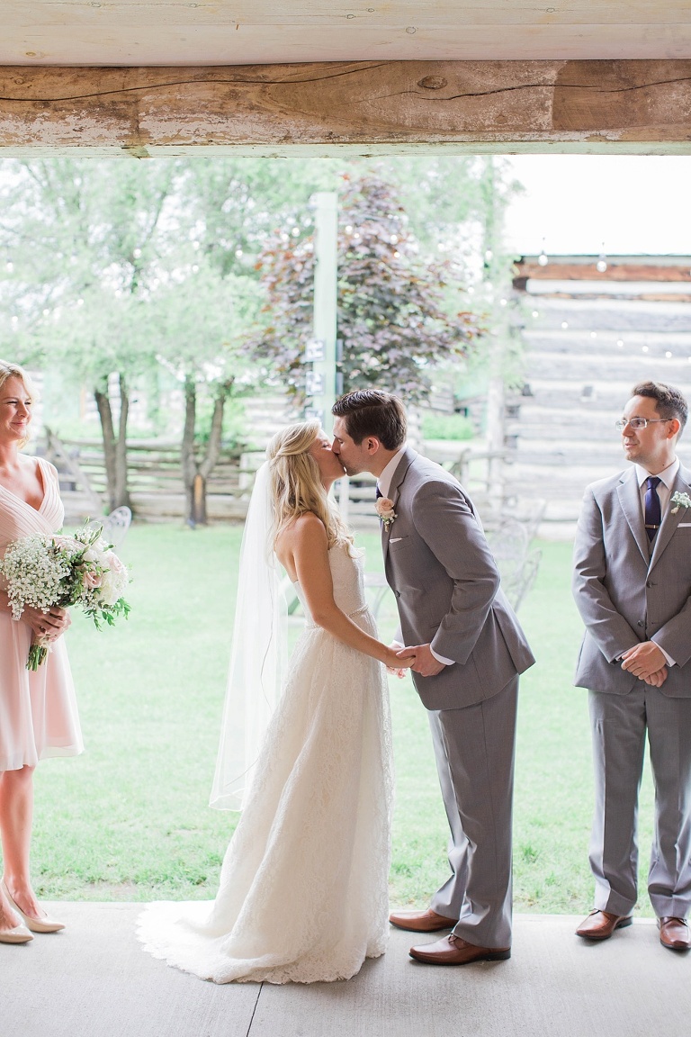 Stonefields Heritage Farm Wedding - ceremony photo on covered barn terrace
