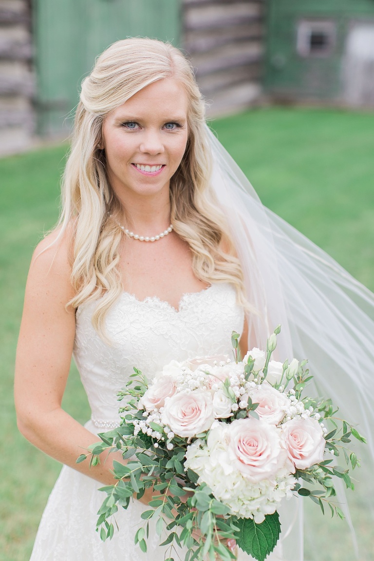 Stonefields Heritage Farm Wedding - bride and groom photos around farmhouse and barn