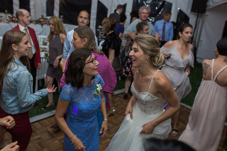 Almonte Herb Garden Summer Wedding - White tent reception with string lights and dance floor